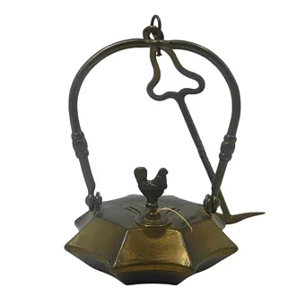 ANTIEKE MESSING MIJNLAMP MET HANENFIGUUR.