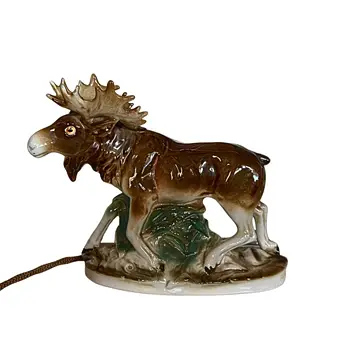 Kadzielnica - figurka łosia z porcelany.
