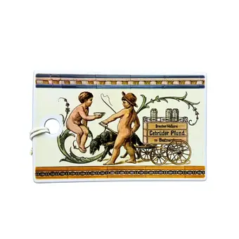 NPM Míšeňský porcelánový kachel – Dresdner Molkerei Gebrüder Pfund.