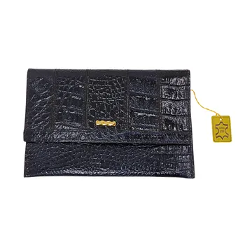 Pochette en cuir effet croco avec certificat d'authenticité.
