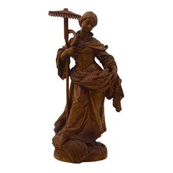Drewniana figura świętej Notburgi.