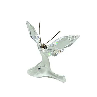 SWAROVSKI SCHMETTERLING AUF EINEM BLATT.