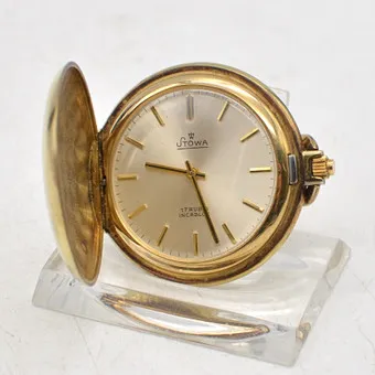 Stowa, Art Deco pocket watch, gold-plated case, geometric patterns, hand-wound, Germany, early 20th century.