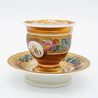 Porcelain cup with saucer, early 19th century French Empire, cartouche with monogram, hand-painted, floral decor.
