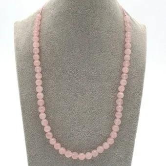 Rozenkwarts parelketting, gepolijste parels, verstelbare koordsluiting, 20e eeuw, ca. 55 cm.