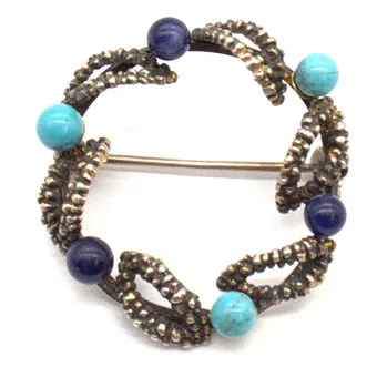 835 zilveren designerbroche "MONA", bezet met lapis lazuli en turkoois.