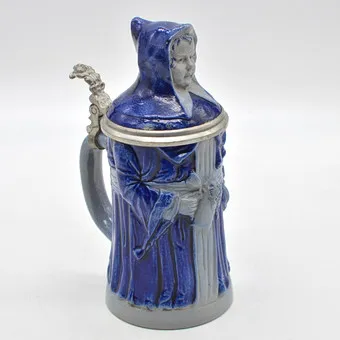КУВШИН-ФИГУРА, МОНАХ, КАМЕННАЯ МАССА, СИНЯЯ ГЛАЗУРЬ, ОЛОВЯННАЯ ОПРАВА, ГЕРМАНИЯ, 19 ВЕК.