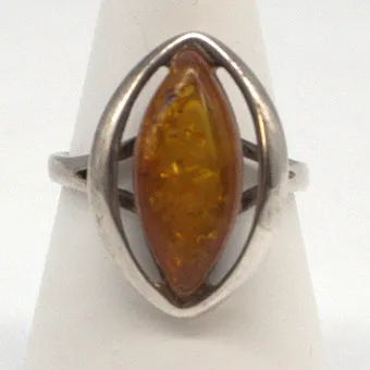 Designer ring sterling silver set with amber, openwork setting, 20th century.