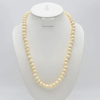 COLLIER AUS KNOCHENPERLEN, HANDGEMACHT, 1950ER JAHRE, CA. 60CM.