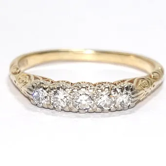Ring 585 goud art deco diamanten.