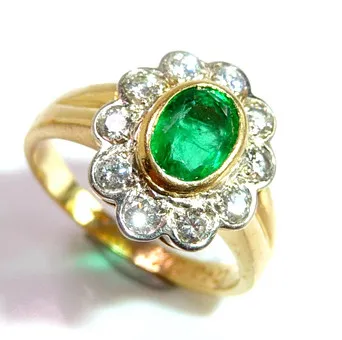 Ring 750 Gold mit Diamanten und Smaragd, Blüte.