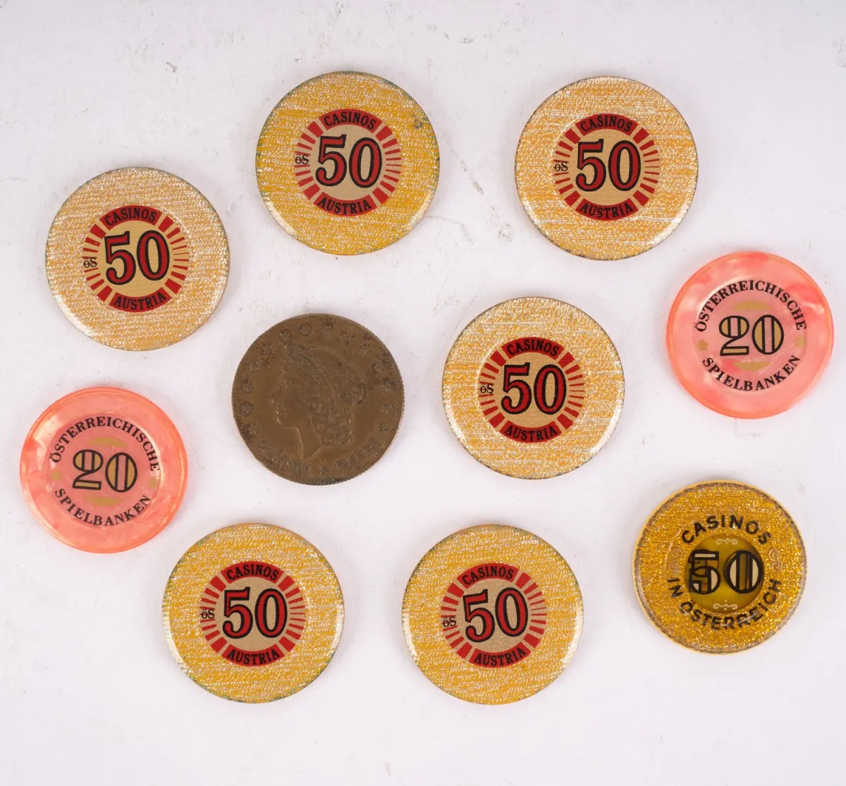 Collection de 10 jetons de jeu (banque) divers. 9x Autriche et 1x inconnu.