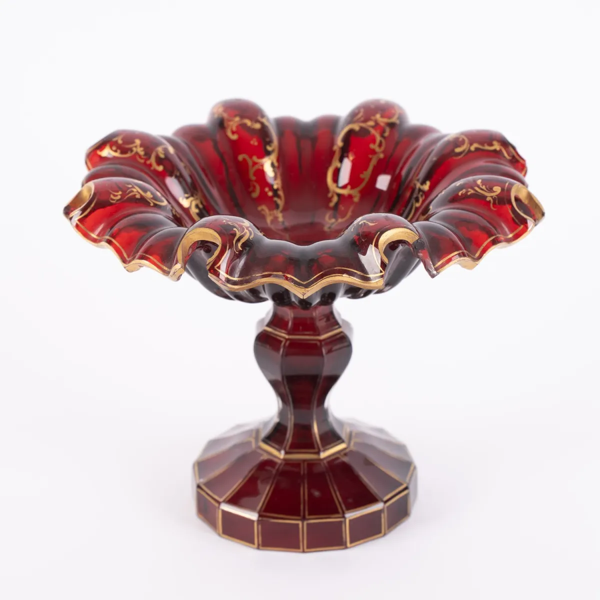 Bohemian tazza, thick-walled ruby cased glass with elaborate gold decoration, 19th/20th century, the rim with ...