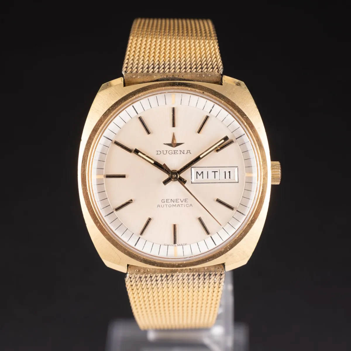 Dugena Herrenarmbanduhr der wohl 1960 / 70er Jahre, Automatik, Anzeige mit Wochentag und Datum. Zentrale Sekunde, Werk l…
