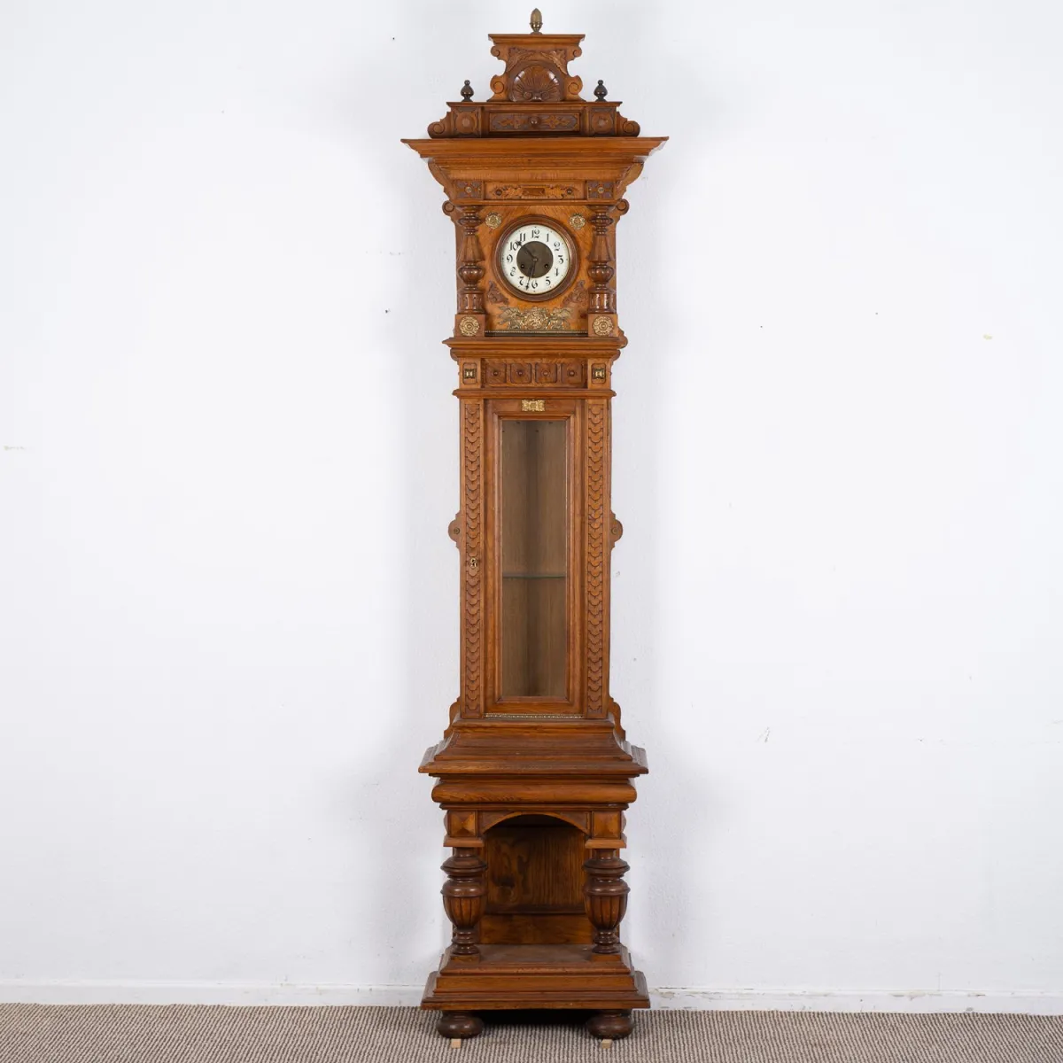 Magnificent Historicism grandfather clock, German around 1890, solid, light oak case with elaborate carved decoration and...