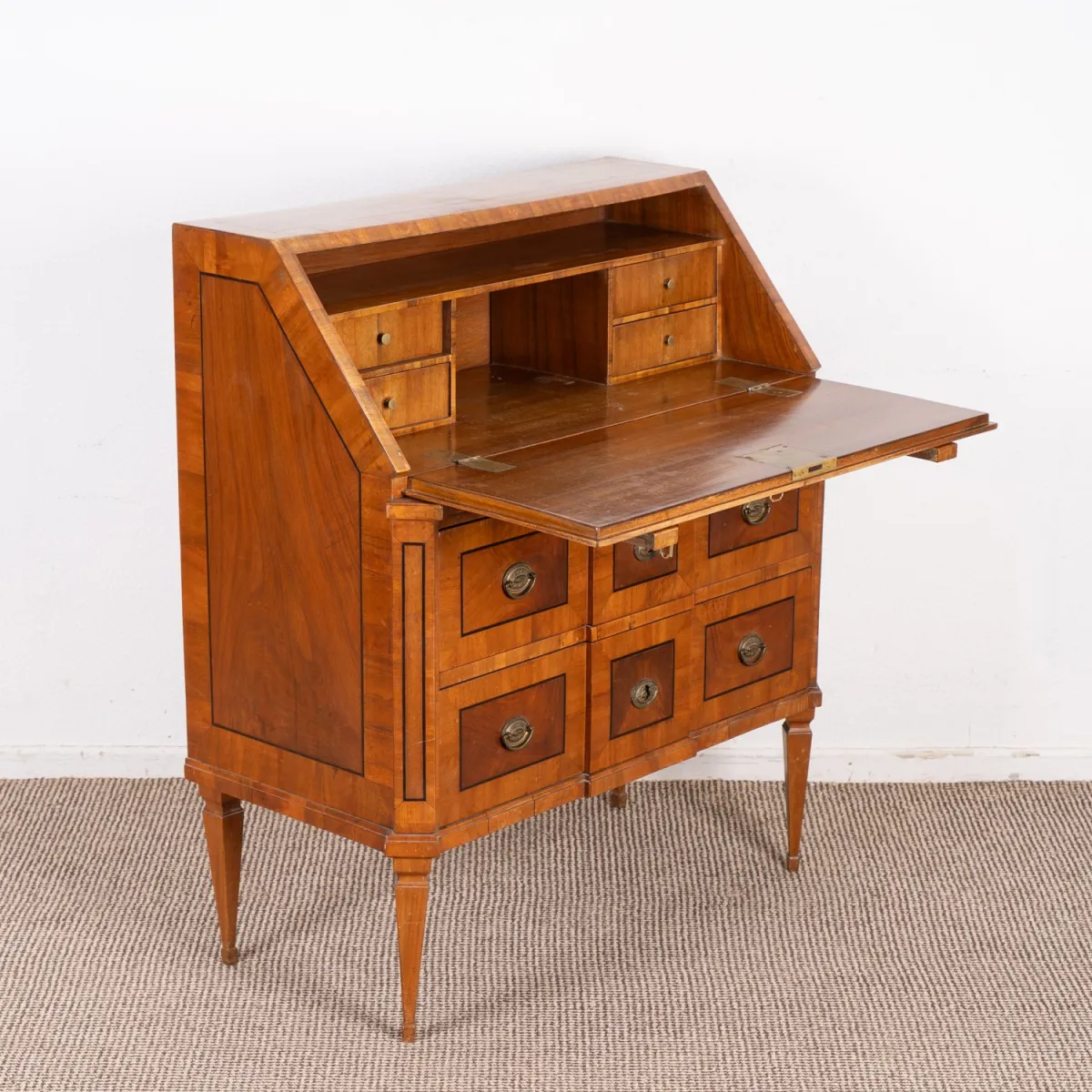 Classicist secretary, Louis XVI, circa 1780, solid and veneered walnut, ebonised band inlays on front