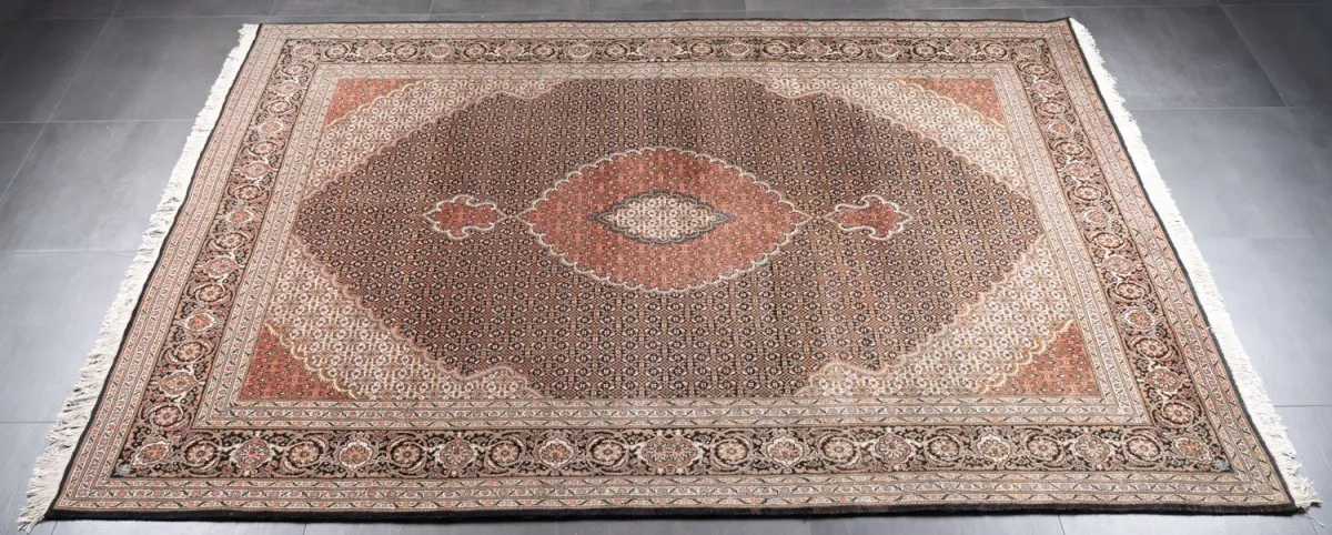 Tabriz, beige-brown ground rug, all-over patterned field, approx. 2 x 3 m. Good uncleaned condition, hard-wearing