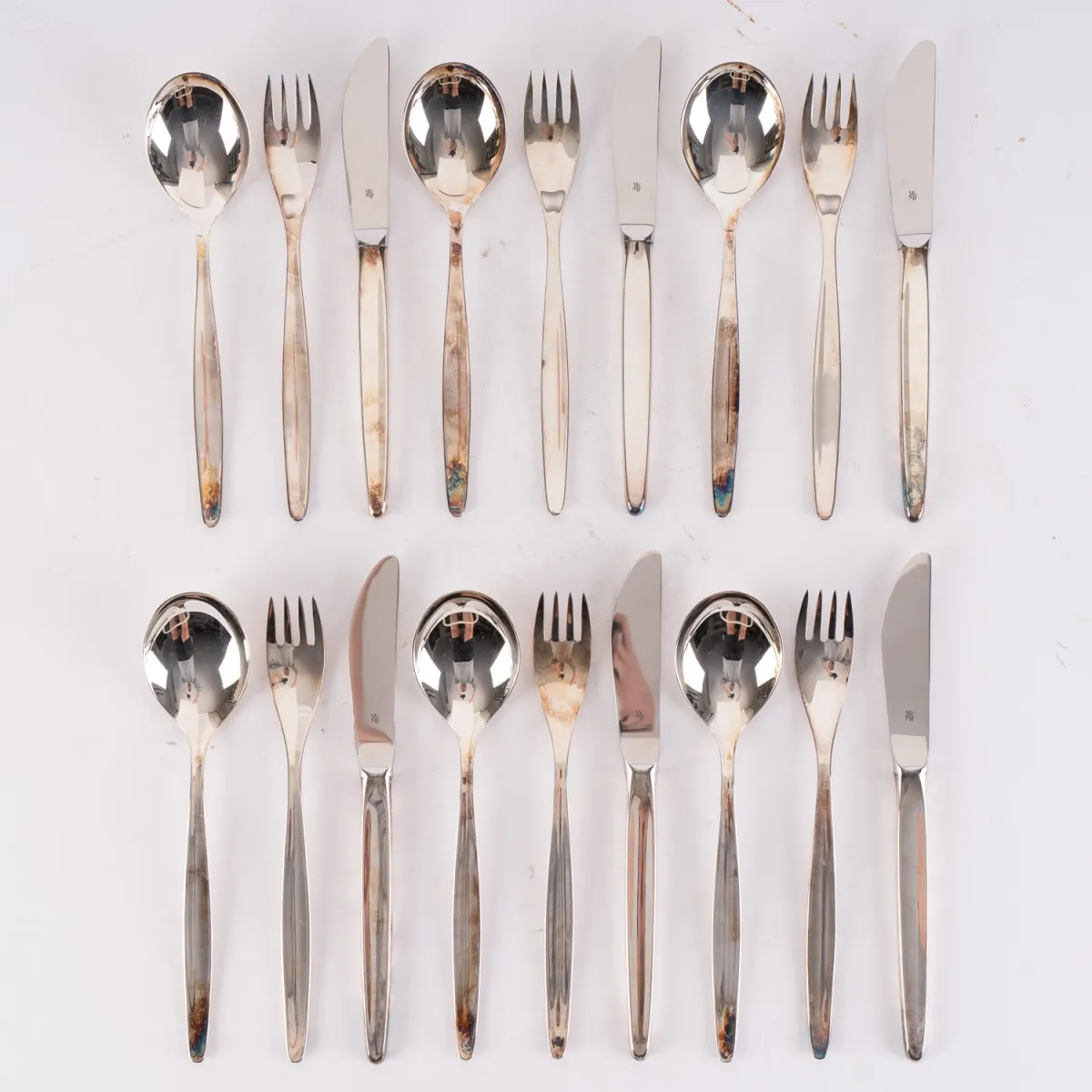 (A) 18-piece menu cutlery set, 925 sterling silver by WMF, very plain design, for 6 people. Length of…