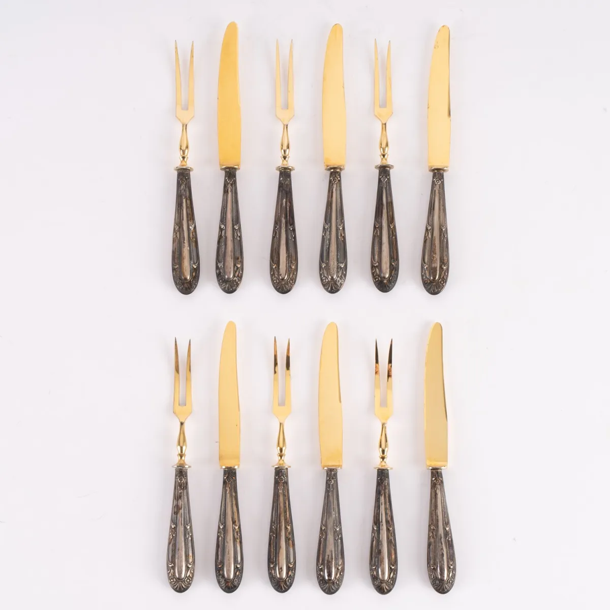 12-piece fruit cutlery set for max. 6 people, 800 silver handles, intricately chased and crafted. Fork tines and…