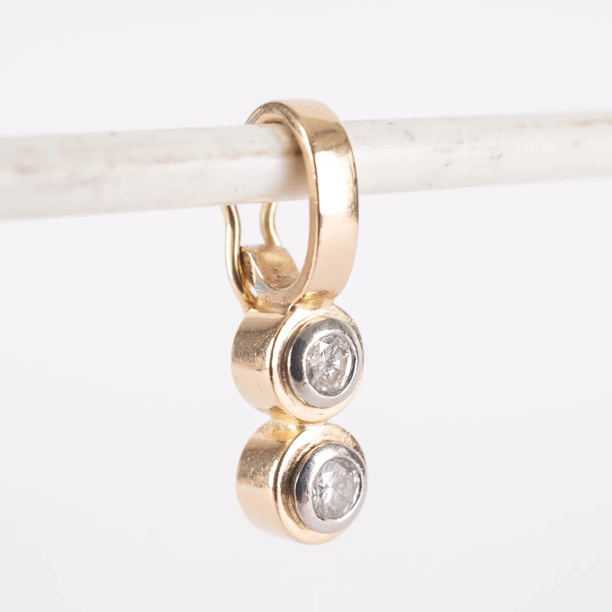 Necklace pendant / clip pendant, setting in 18kt / 750 yellow gold, set with 2 brilliants in white gold setting, together …
