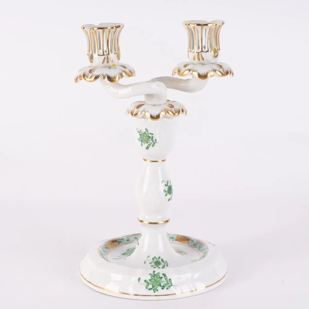 2-arm candlestick, Herend, Hungarian white porcelain with hand-painted Apponyi decor in green tones and rich…
