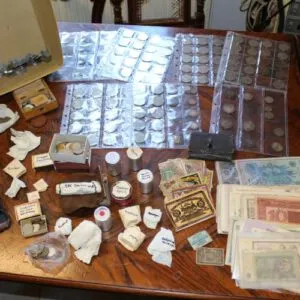 Large lot of banknotes, many different coins from various countries, some silver