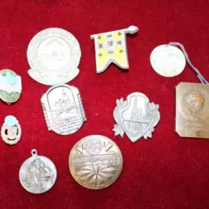 10 old badges, various motifs around 1900