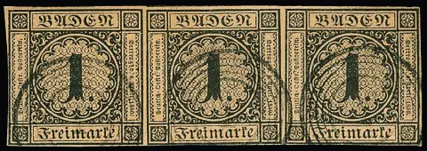 1 Kr. schw./bräunlich, waagerechter Pracht-Dreierstreifen mit NS "1" (Aach), die mittlere Marke unten winzig berührt, sonst breitrandig. Attest Stegmüller:…