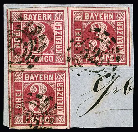 3 Kr. rosarot, breitrandig geschnittener Dreierblock auf blauem Briefstück mit oMR "325" (München), zwischen zwei Marken leichte Brieffalte. Es sind nur…