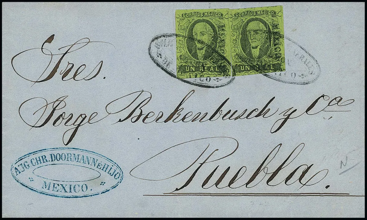 1 R. černá/zelená, dva dobře střižené exempláře s přetiskem "Mexico" na dostavníkovém dopise z Mexico City do Puebly (10. lis. 1862), orazítkované oválným razítkem dostavníkové společnosti "Diligencias Generales de Mexico"