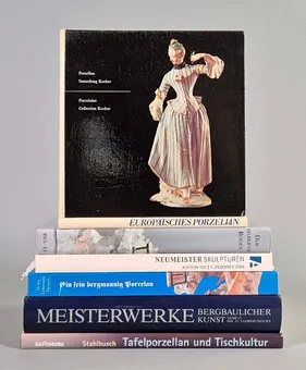 7 ART VOLUMES ON MINING AND PORCELAIN.