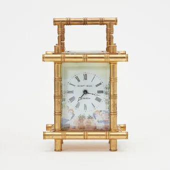 TRAVEL / TABLE CLOCK, brass, porcelain, key wind, circa 1900, London, England.