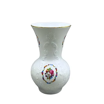 KPM Royal Porzellan vase with relief decoration and colorful floral motifs.
