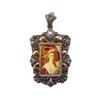 Pendant with lady's portrait and engraving on the back, dated 1957.