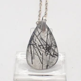 TOURMALINE QUARTZ PENDANT, TEARDROP SHAPE, DESIGNER CHAIN IN 835 SILVER, LATE 20TH CENTURY.