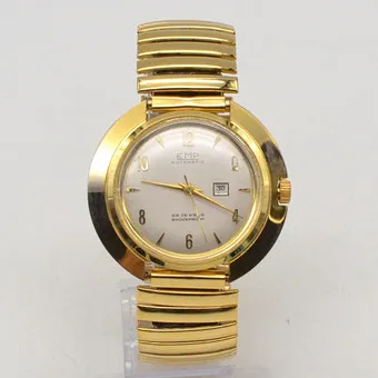 EMP Automatic, 25 rubis, montre-bracelet homme des années 1960, boîtier et bracelet extensible dorés, daydate, remontage manuel.
