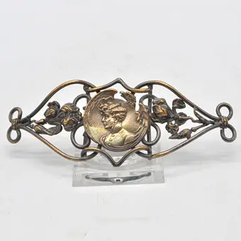 Jugendstil gesp, jongeling en rozen, brons, opengewerkt, circa 1900.