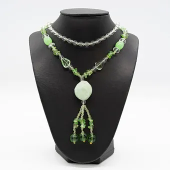 Necklace with a large jade gemstone and various glass colored stones in green and clear glass, endless chain.