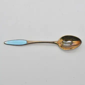 FRIGAST DENMARK, MOKKALÖFFEL, STERLINGSILBER, VERGOLDET UND BLAU EMAILLIERT, 20. JAHRHUNDERT.