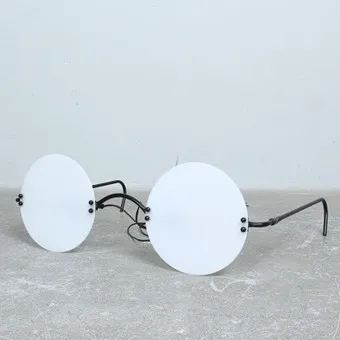 BAG TURGI. ATTRIBUTED. Table/floor lamp in the shape of 'Reading Glasses' 1980s, Switzerland.