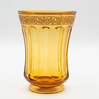 LEO MOSER. GLASS VASE BY MOSER KRISTALLGLASWERKE, KARLSBAD, CZECHOSLOVAKIA, ART DECO, AMBER OR TOPAZ-COLORED CRYSTAL GLASS, DESIGN FROM C. 1914–1925, 24-KARAT GOLD-GILDED FLORAL BAND, MOUTH-BLOWN.