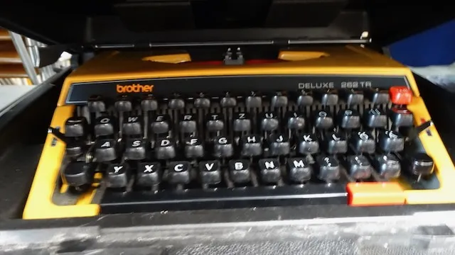 1 psací stroj