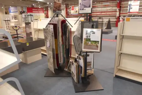 2x Goods display, with contents (carpet samples)