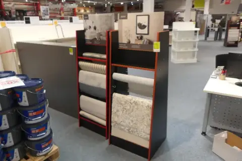 2 display stands, with contents (non-woven wallpaper)