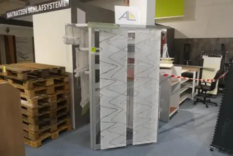 Display stand, with contents (curtains)