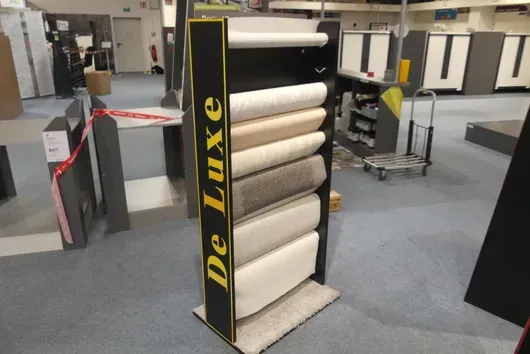Display stand, with contents (non-woven wallpaper)