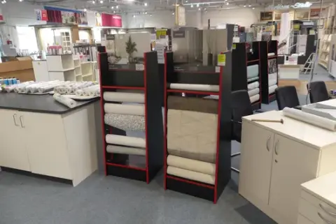 2x display stands, with contents (non-woven wallpaper)