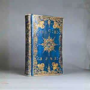 Vazby – Modrá zlacená lepenková vazba. Německo 1782