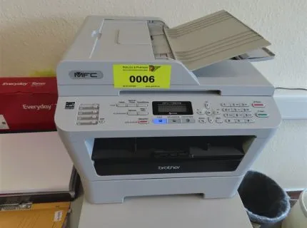 1 multifunction device, make: Brother, type: MFC-7360NE, on printer table