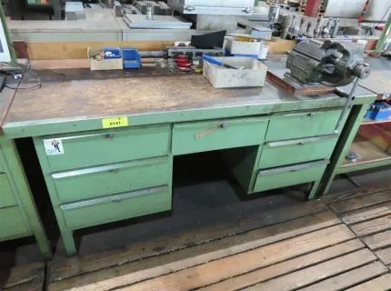 1 workbench, approx. 180 x 90 cm, with 2 base cabinets, 3 drawers each, mounted vice